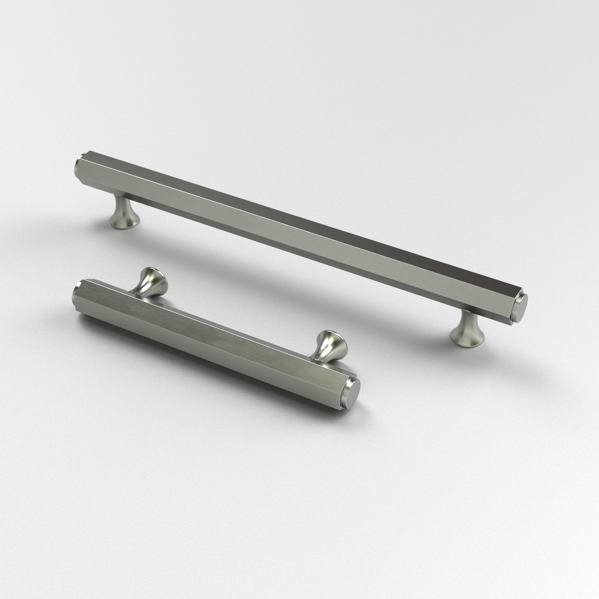 two satin nickel-finished brass hexagon cabinet pulls. The Battersea Cabinet Pull displayed here against a white background.