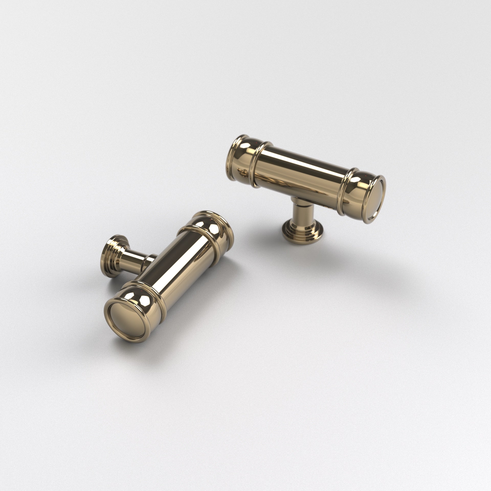 two polished brass-finished brass traditional t-bar cabinet pulls. The Esher T-Bar Cabinet Pull displayed here against a white background.